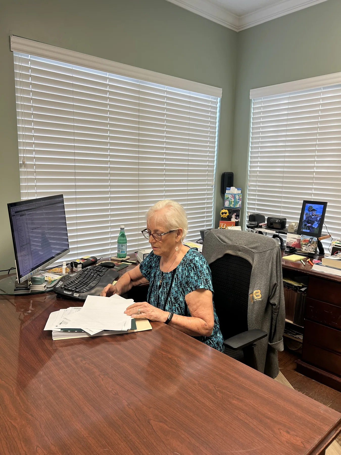 Dianne Briery working through paper records