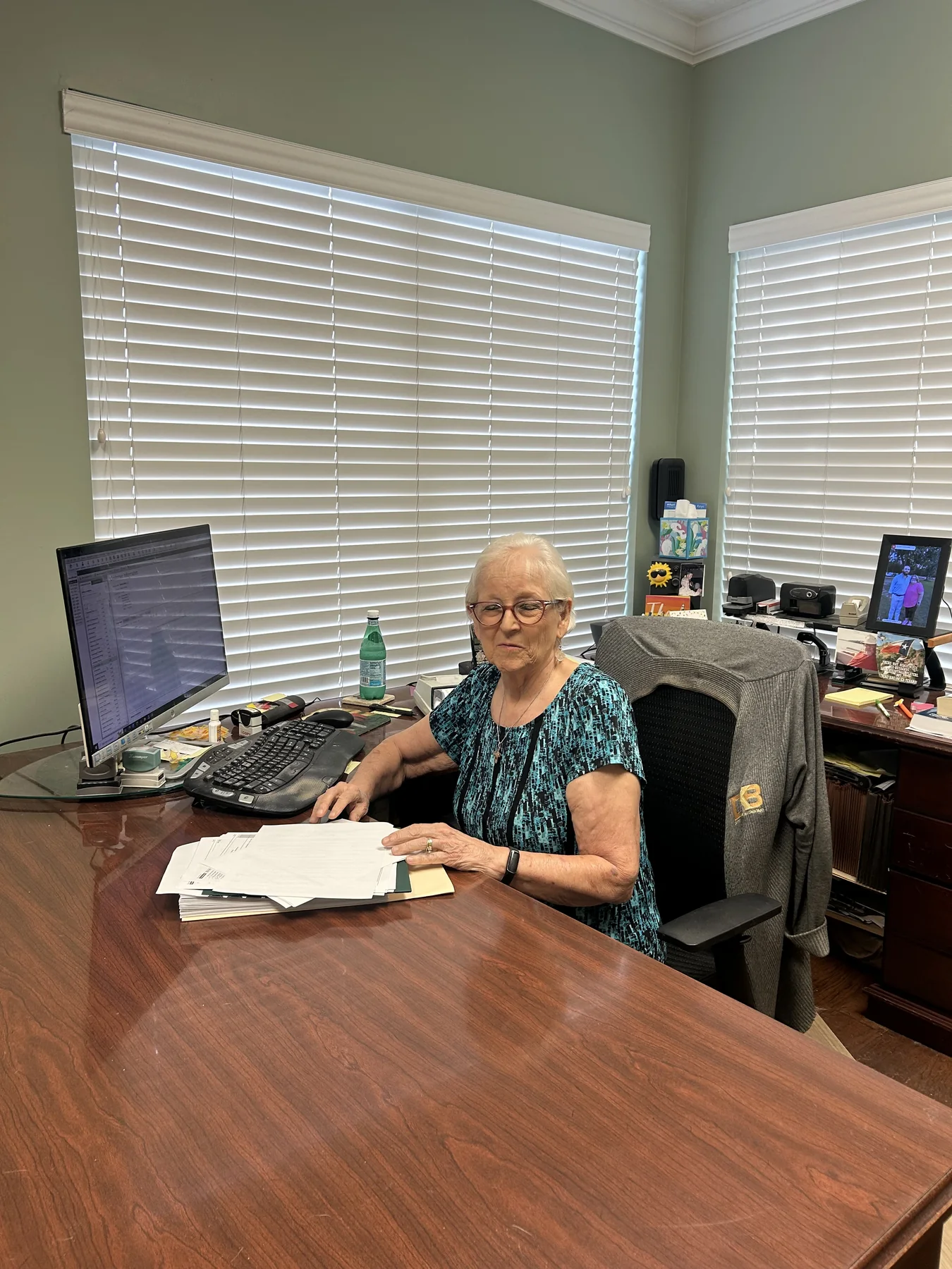 Dianne Briery working with client files in her Jacksonville office